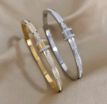 Load image into Gallery viewer, Exquisite Stainless-Steel Bangle with Crushed Zirconia and Secure Lock Clasp.
