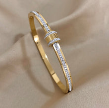 Load image into Gallery viewer, Exquisite Stainless-Steel Bangle with Crushed Zirconia and Secure Lock Clasp.
