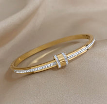Load image into Gallery viewer, Exquisite Stainless-Steel Bangle with Crushed Zirconia and Secure Lock Clasp.

