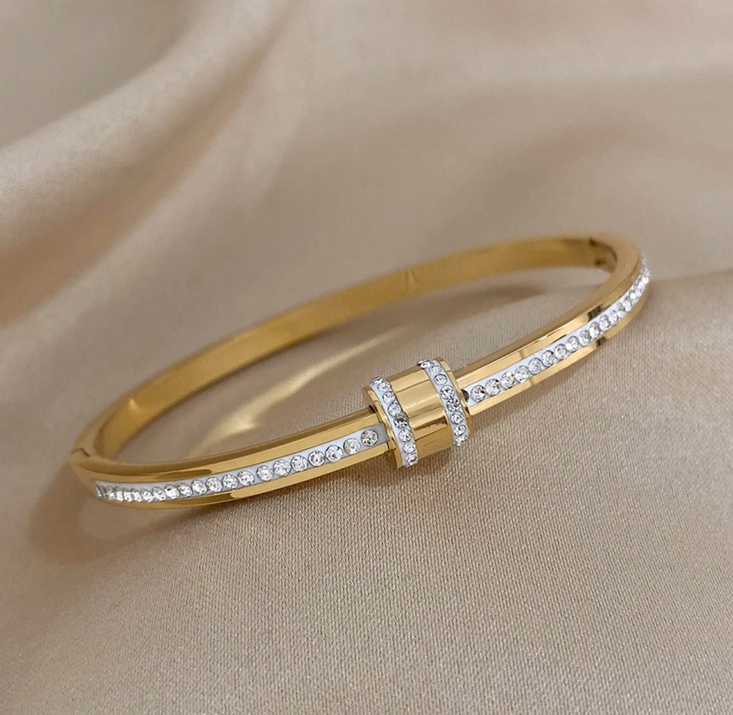 Exquisite Stainless-Steel Bangle with Crushed Zirconia and Secure Lock Clasp.